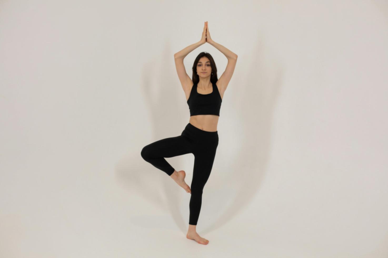 A peaceful yoga session showing gentle restorative poses
